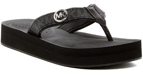 michael kors black flip flops uk|michael kors black suede sandals.